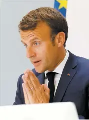  ?? PHOTO AFP ?? Le président français Emannuel Macron s’est entretenu avec le patron de l’OMS, hier, par vidéoconfé­rence.