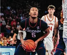  ?? Peter K. Afriyie/Associated Press ?? UConn’s Stephon Castle looks to shoot against St. John’s during the first half on Saturday in New York.