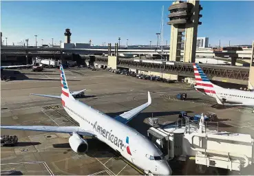  ?? — AFP ?? Huge problem: American Airlines is scrambling to avoid thousands of cancellati­ons over the busy holiday travel period after a scheduling glitch left many flights without pilots.