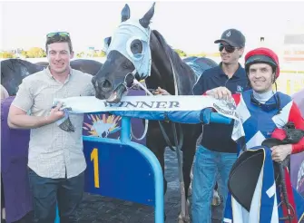  ?? Picture: GLENN HAMPSON ?? Trainer Ben Currie with Kuttamurra Al, strapper Jayden Sims and jockey Mark Pegus after a win at the Gold Coast earlier this year.