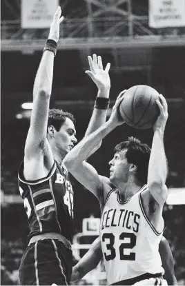  ?? AP FILE PHOTO ?? SHOWING A LOT OF FIGHT: Kevin McHale and the Celtics had plenty of memorable battles with the Bucks in the 1980s, including this one against Randy Breuer in 1986, but one stands out.