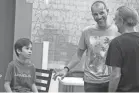  ??  ?? Memphis director Matteo Servante, center, leads actors John Diehl and 9-year-old Max Havens during a rehearsal for his short film “Nessun Dorma” Thursday at the Playhouse on the Square.