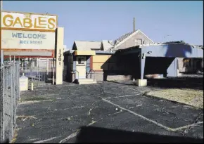  ??  ?? The boarded-up The Gables motel on 1301 Fremont St.