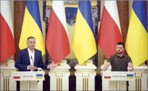  ?? AP photo ?? Ukrainian President Volodymyr Zelenskyy (right) and Polish President Andrzej Duda, attend a news conference after their meeting in Kyiv, Ukraine on Sunday.