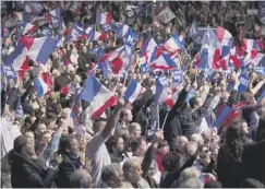  ??  ?? 0 Le Pen supporters at a campaign meeting in Paris