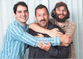  ?? CHRIS PIZZELLO/INVISION/AP ?? Adam Sandler, center, star of the film “Uncut Gems,” poses for a portrait with co-directors Benny Safdie, left, and his brother Josh Safdie during the Toronto Internatio­nal Film Festival in Toronto.