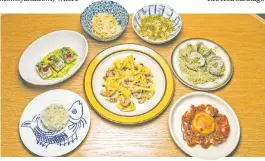  ??  ?? Momofuku Nishi’s feast is an Italian-Asian garden of seafood delights.