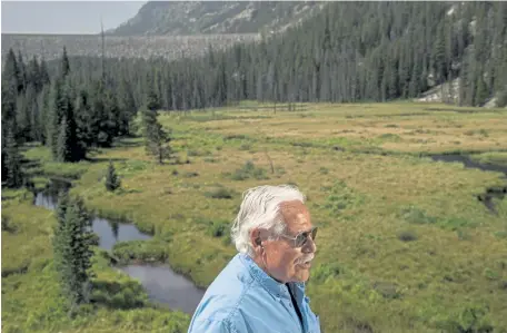  ?? Daniel Brenner, Special to The Denver Post ?? Colorado Headwaters president Jerry Mallett visits a site proposed by Aurora and Colorado Springs for a new dam and reservoir on Aug. 21 in the Homestake Valley between Leadville and Minturn.