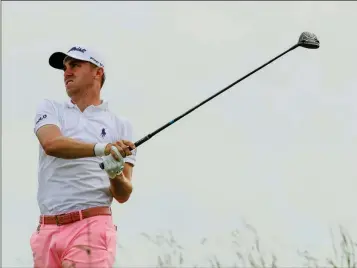  ?? ASSOCIATED PRESS ?? JUSTIN THOMAS HITS A DRIVE ON THE 18TH HOLE during the third round of the U.S. Open on Saturday at Erin Hills in Erin, Wis.