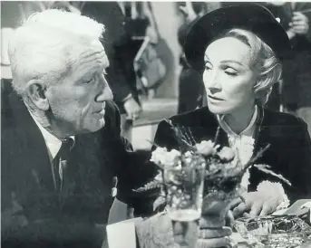  ??  ?? TRAITOR HEARTS: Spencer Tracy and Marlene Dietrich in the 1961 film ‘Judgment at Nuremberg’, which is mentioned in Sands’s book