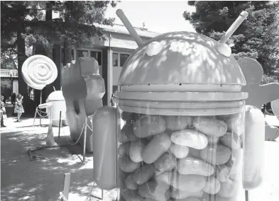  ??  ?? ABOVE: A sculpture is shown May 18 at Google’s Mountain View, Calif., campus depicting the 2012 version of Android, known as Jelly Bean. Although three newer versions have been released, a quarter of Android phones are still using Jelly Bean or older....