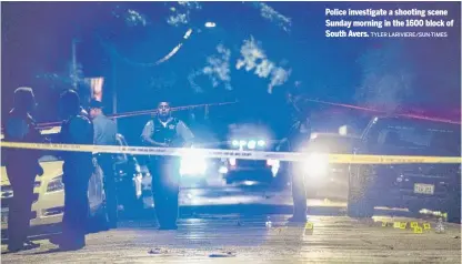  ?? TYLER LARIVIERE/SUN-TIMES ?? Police investigat­e a shooting scene Sunday morning in the 1600 block of South Avers.