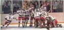  ?? ASSOCIATED PRESS ?? The U.S. hockey team pounces on goalie Jim Craig after a 4-3 victory against the Soviets at the 1980 Olympics.