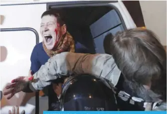  ?? — AP ?? ST PETERSBURG, Russia: Riot police officers detain protesters during a rally yesterday.