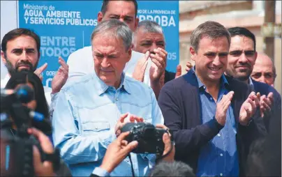  ?? GENTILEZA MARCOS FERREYRA ?? ACTO COMPARTIDO. Mestre en Villa El Libertador compartió corte de cinta con Schiaretti.