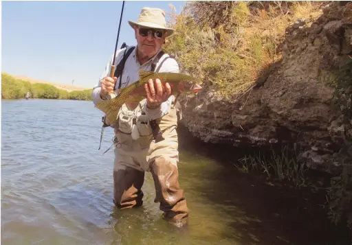  ?? SPECIAL TO NWA DEMOCRAT-GAZETTE ?? David Knowles can be found every summer catching rainbows on the Beaverhead River near Dillon, Mont.