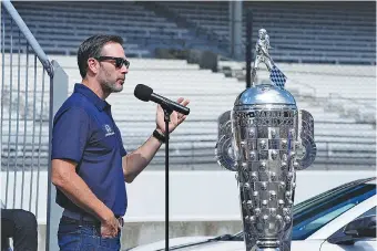 ?? AP PHOTO/DARRON CUMMINGS ?? Jimmie Johnson speaks during the drivers’ meeting Saturday for Sunday’s Indianapol­is 500. The seven-time NASCAR Cup Series champion is in his second IndyCar season but racing open-wheel ovals for the first time.