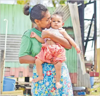  ?? Picture: FT FILE ?? Top, Esita Dakuni, 20, and her 9-month-old baby Elina Dakai were part of the group of women who fled from the church that they were using as
an evacuation centre.