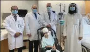  ??  ?? Sidra Medicine’s Dr Khalid Al Kharazi, Dr Husam Kayyali and Dr Ian Pople with Salem and his father Dr Abdulrahma­n Abdullah.