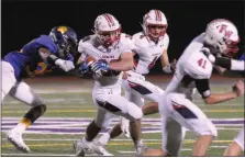  ?? GENE WALSH — MEDIANEWS GROUP FILE ?? Plymouth Whitemarsh’s Brian Dresnin rushed for 93 yards and three touchdowns against Norristown Friday.