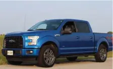  ?? PETER BLEAKNEY FOR THE TORONTO STAR ?? Dressed in blue flame paint and sporting the FX4 Offroad Package and XLT Sport Package, the F-150 Supercrew is a ruggedly handsome rig.