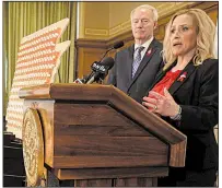  ?? Arkansas Democrat-Gazette/STATON BREIDENTHA­L ?? Arkansas Attorney General Leslie Rutledge, announcing the lawsuit Thursday at the state Capitol with Gov. Asa Hutchinson, said opioids have created “a lethal and tragic addiction that is destroying lives.”