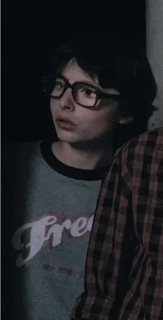  ?? WARNER BROS ?? Finn Wolfhard in a scene from the horror remake, It, which is based on Stephen King’s 1986 novel.