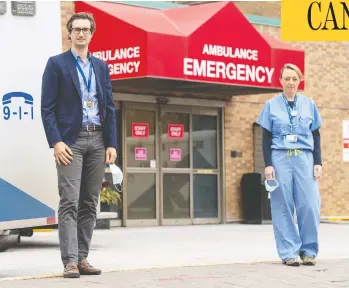  ?? FRANK GUNN / THE CANADIAN PRESS ?? Dr. Jerome Leis and Dr. Lynfa Stroud were at Sunnybrook Hospital in Toronto a year ago, when a patient with what
seemed to be mild pneumonia eventually turned out to be “Patient Zero” in the COVID-19 pandemic to come.