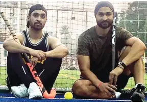  ??  ?? Actor Diljit Dosanjh with hockey player Sandeep Singh