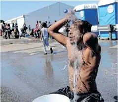  ?? BRENDAN MAGAAR African News Agency (ANA) ?? REFUGEE Rafeeq Mohammad, from Bangladesh, washes himself. The group of refugees were moved from the Central Methodist Church to Bellville. |