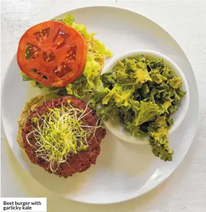  ??  ?? Beet burger with garlicky kale