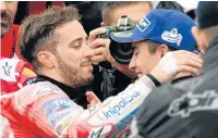  ?? Picture: AFP ?? BRING IT ON: Ducati rider Andrea Dovizioso, left, seen with Honda rider Marc Marquez, is looking forward to the Australian MotoGP