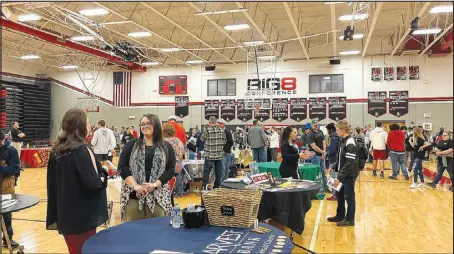  ?? ALEXUS UNDERWOOD/SPECIAL
TO MCDONALD COUNTY PRESS ?? Students and vendors are shown visiting at the MCHS career fair. DECA and FBLA students volunteere­d to set up the fair, help run the fair, and clean up after the career fair.