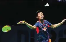  ?? AFP ?? Long shot Chen Long of China hits a return to Jan O. Jorgensen of Denmark during their men’s singles match. Long qualified for the semis along with Momota, Jorgensen and Axelsen.
