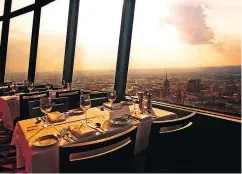  ?? VISITSANAN­TONIO.COM ?? Visitors can take in the view of the city from the Tower of the Americas Restaurant.