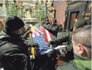  ?? MATEUSZ NOWAK/AP ?? Ukrainians soldiers participat­e in the farewell ceremony for U.S. citizen Daniel W. Swift in Lviv, Ukraine, on Tuesday.