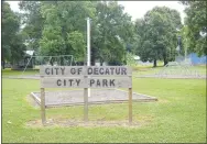  ?? Westside Eagle Observer/MIKE ECKELS ?? The Old City Park in Decatur is now open after the Decatur city council voted to open all Decatur park play areas which were closed due to the covid-19 outbreak. While all play equipment opened, the council decided to leave park buildings, restrooms, and concession stands at all three Decatur parks closed to the public.