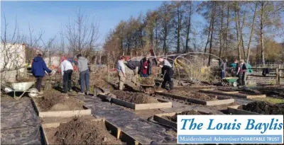  ??  ?? Students work on the beginnings of a vegetable patch at BCA.