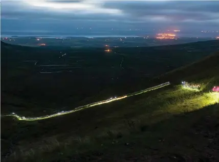  ??  ?? Night time walkers hike up Benbulben for the annual fundraiser for Sligo Leitrim Mountain Rescue Team