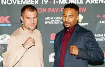  ?? MICHAEL REAVES/GETTY IMAGES/AFP ?? Sergey Kovalev (left) and Andre Ward pose for photos at a press conference for the Kovalev v Ward ‘Pound for Pound’ bout at Le Parker Meridien in New York City on September 6.