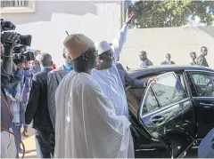  ?? AFP ?? President Adama Barrow waves after his swearing in as president at the Gambian embassy in Dakar, Senegal. He returned to Banjul on Thursday.