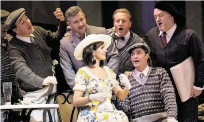  ?? Ken Howard / Metropolit­an Opera ?? Soprano Angela Gheorghiu, center, plays Magda in the Metropolit­an Opera’s production of Giacomo Puccini’s “La Rondine,” which will be shown Wednesday at select area theaters.