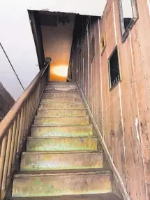  ?? ALANA EDGIN/ THE SAN ANGELO STANDARD-TIMES ?? The staircase inside the Olde Park Hotel in Ballinger, Texas, where, according to some witnesses, the activity never stops. From full-body apparition­s to cold spots, this century-old hotel is a hot spot for the paranormal.