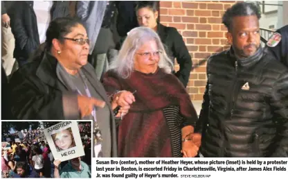  ?? STEVE HELBER/AP ?? Susan Bro (center), mother of Heather Heyer, whose picture (inset) is held by a protester last year in Boston, is escorted Friday in Charlottes­ville, Virginia, after James Alex Fields Jr. was found guilty of Heyer’s murder.