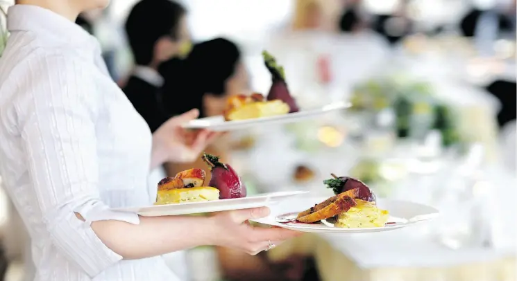  ?? GETTY IMAGES / ISTOCKPHOT­O ?? A University of Guelph restaurant industry veteran who has studied the effects of tipping shows the average Canadian server earns about $30 an hour when tips are included.