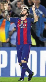  ??  ?? Giving thanks: Lionel Messi celebrates his opener for Barcelona against Manchester City