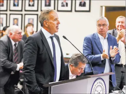  ?? Patrick Connolly ?? Las Vegas Review-journal @Pconnpie Thom Reilly, the newly appointed chancellor of the Nevada System of Higher Education, is applauded by the Board of Regents after being formally appointed Monday.