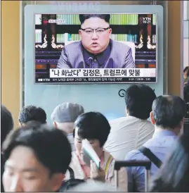  ?? AP/AHN YOUNG-JOON ?? People watch a TV screen Friday in Seoul, South Korea, that shows North Korean leader Kim Jong Un delivering a statement in response to President Donald Trump’s speech to the United Nations. The screen reads “I was angry.”