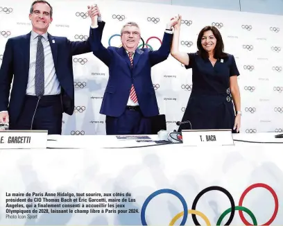  ?? Photo Icon Sport ?? La maire de Paris Anne Hidalgo, tout sourire, aux côtés du président du CIO Thomas Bach et Éric Garcetti, maire de Los Angeles, qui a finalement consenti à accueillir les jeux Olympiques de 2028, laissant le champ libre à Paris pour 2024.