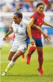  ??  ?? Sydney Leroux, left, races for the ball against South Korea defender Shim Seoyeon. Dom Dwyer, right, warms up before the team’s internatio­nal friendly soccer match against Ghana in East Hartford, Conn. Dwyer and Sydney Leroux were born abroad, came to...